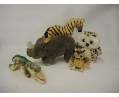 Group of five Steiff soft toys including an alligator etc. 