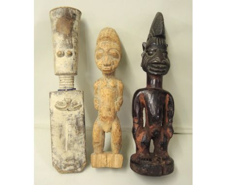 Three African tribal carved wooden fertility figures (Ibeji, Baule, Fante), the tallest 28cm 