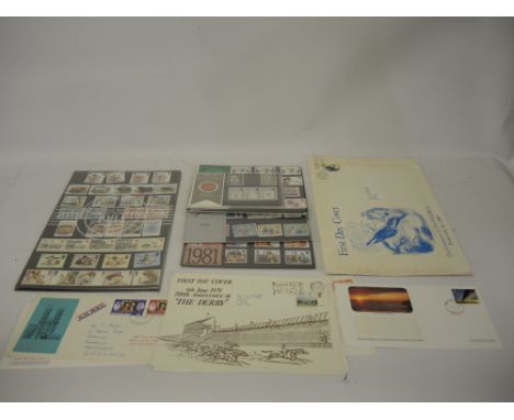 Quantity of commemorative crowns etc together with a quantity of stamps, mainly UK year sets and First Day covers 