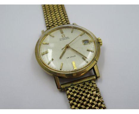 Gentleman's Omega Seamaster De Ville 9ct gold cased wristwatch, the champagne dial with baton numerals, date aperture and swe
