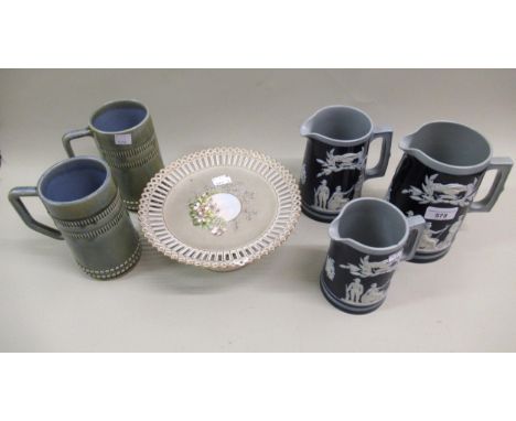 Three Copland Pottery blue and white graduated stoneware jugs with various figures of soldiers, another pair of tankards and 