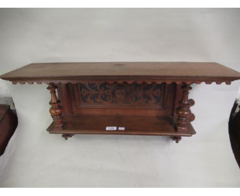 Small late Victorian walnut two shelf wall bracket with turned supports 