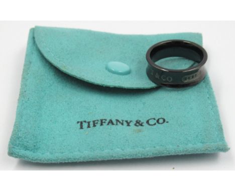Tiffany & Co. titanium ring, with original pouchSize N 