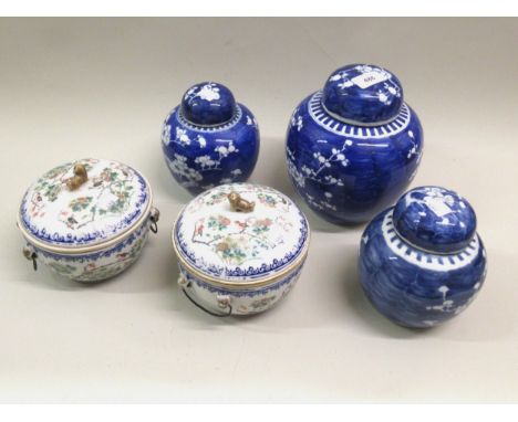 Chinese blue and white prunus blossom decorated ginger jar and cover, together with two similar, smaller and two further cove
