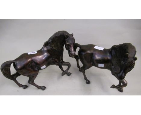 Pair of heavy brown patinated bronze figures of horses 