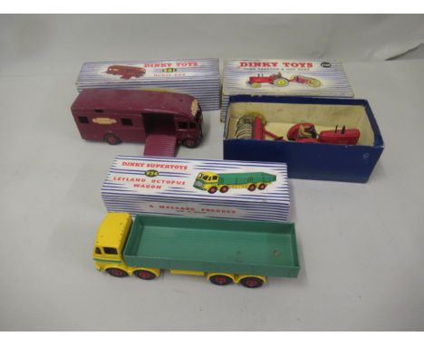 Dinky toys horsebox No. 981, Dinky Supertoys Leyland Octopus wagon No. 934 and a Dinky Toys farm tractor and hay rake No. 27A