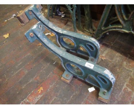 Pair of modern green painted cast iron bench ends 