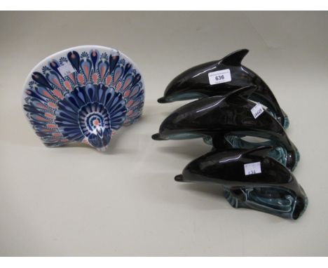 Pair of large Poole pottery figures of dolphins, 18cm long, together with another similar, smaller figure, and a Sargadelos p