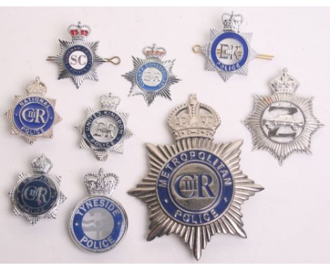 A small Quantity of Tv/Film Prop police badges, including from Tv programme 50 Degrees North cap badge ( 9 items) 