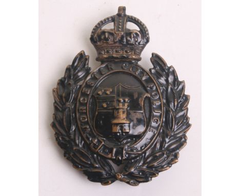 Worcester City Police Kings Crown Helmet Badge, black on brass wreath, complete with two lug fittings on the reverse, in good