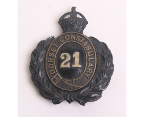 Dorset Constabulary Helmet Plate, Kings crown, black wreath, white metal divisional numbers ‘21’  complete with three lug fit