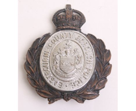 Eastbourne County Borough Police Helmet Badge, Kings Crown black wreath/chrome centre, with two lug fittings on the reverse