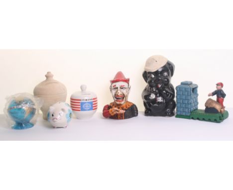 Large Quantity of Various Money Boxes, including reproduction cast iron mechanical Artillery Bank, reproduction cast iron Hum