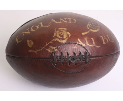 Leather Rugby Ball With Hand Painted Decoration, 4 panel brown leather lace up rugby ball with gold painted decoration for a 