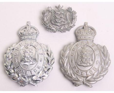 Guernsey Police Helmet plate, Kings crown, white metal wreath, plus a  Kings crown chrome wreath helmet plate and a chrome wr