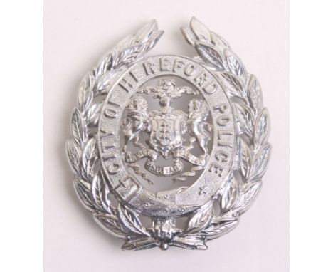 City of Hereford Police Helmet Badge, chrome wreath, coat of arms centre, with two lug fittings on the reverse, 