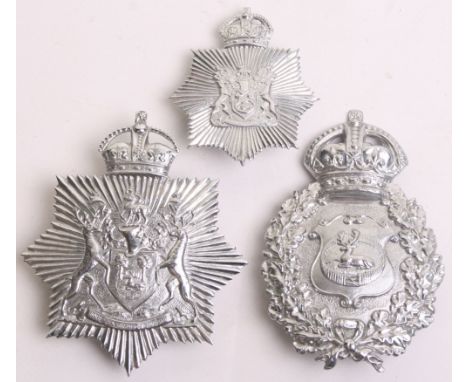 Two Derby Borough Helmet Badges, Kings crown, chrome wreath, Kings crown chrome star and a Kings crown chrome star cap badge 