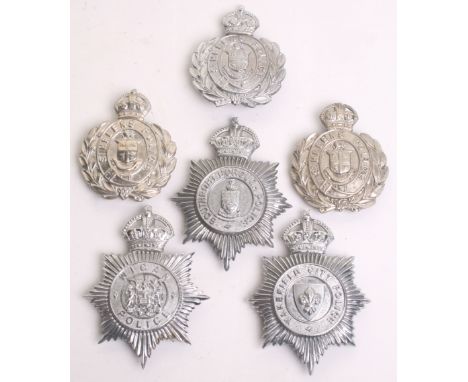 Six Kings Crown Police Helmet Plates, 2 x St.Helens Police white metal wreaths (one missing orb on top of crown) St.Helens Po