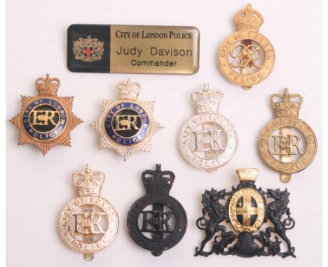 Eight City of London Cap Badges, Kings crown George 6th brass, Queens crown EIIR brass,2 x Queens crown EIIR anodised, Queens