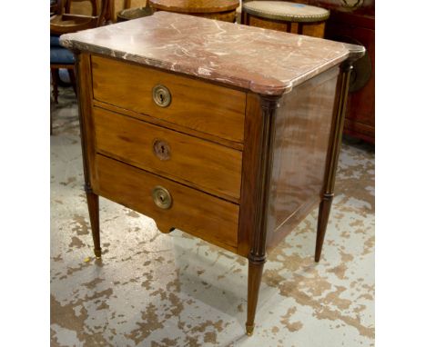 PETITE COMMODE, Directoire mahogany and brass mounted, with a marble top over three drawers, raised on tapering supports, 84c