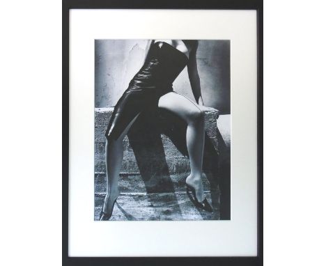 HELMUT NEWTON, photo lithograph on glossy paper, 36cm x 29cm, framed and glazed.