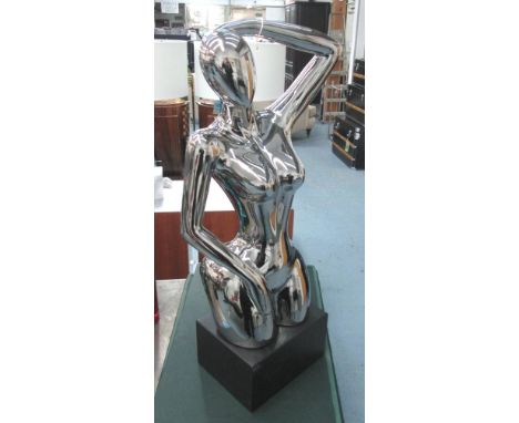 FIGURE OF A FEMALE, in chromed ceramic contemporary style on square base, 73cm H.