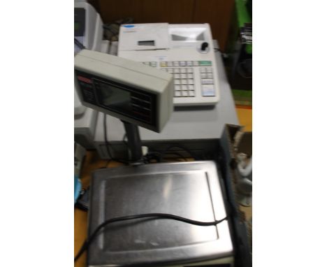 A CASIO SE5300 CASH REGISTER TOGETHER WITH A SET OF AVERY BERKEL FX 220 SCALES