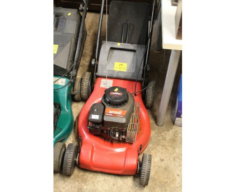 A MTD PETROL LAWN MOWER WITH BRIGGS AND STRATTON ENGINE 