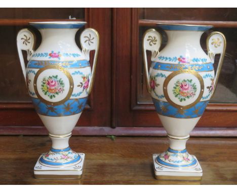 PAIR OF COALPORT STYLE HANDPAINTED, GILDED AND FLORAL DECORATED TWO HANDLED CERAMIC VASES, APPROXIMATELY 28cm HIGH