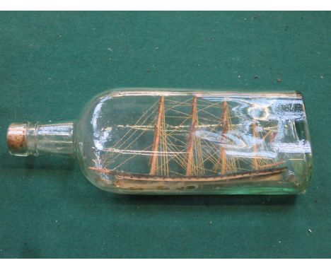 LATE 19th CENTURY FOUR MASTED MODEL SHIP IN BOTTLE 