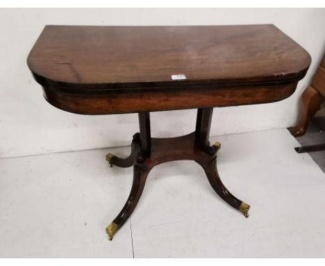 19thC Mahogany Card Table, with a fold-over top (green baize interior), on a 4 pillar base with 4 splayed legs below, brass t