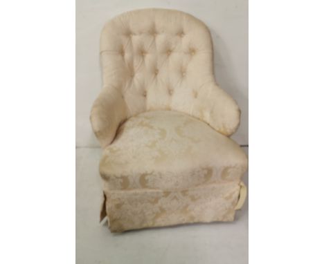 A Victorian button upholstered Nursing Chair, cream floral fabric, turned legs