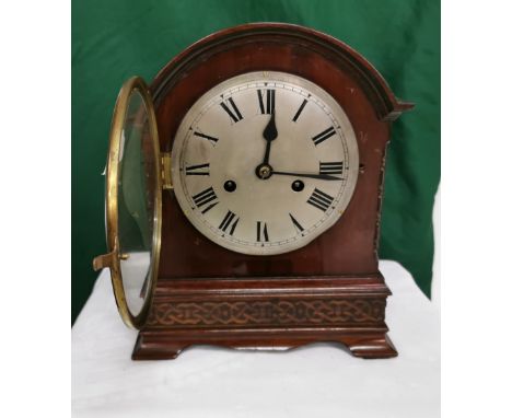 Mahogany Cased Mantel Clock, with a silver dial, chiming movement and a dome shaped top, 29cm x 25cm (1)