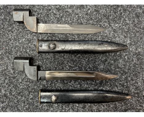 Two No.9 MKI Bayonets with complete with scabbards. One is British made by Poole RSAF with fullered Bowie type blade 196mm in