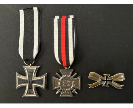 WW1 Imperial German Iron Cross 2nd Class 1914 maker marked ring complete with original ribbon and a Cross of Honour with Swor