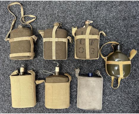 WW2 British 1937 Pattern Water Bottles complete with webbing carriers. Six in total. One in RAF Blue (No cork). Along with a 