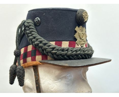 Edwardian Highland Light Infantry Other Ranks Shako. Complete with cap badge, cockade and cords. Liner has original paper mak