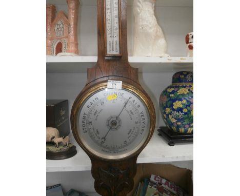 an oak aneroid barometer