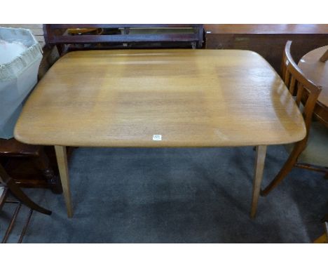 An Ercol Golden Dawn dining table