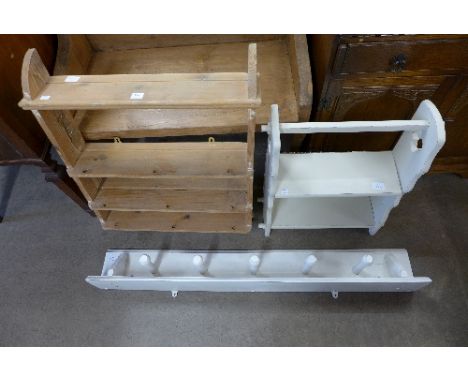 Two wall shelves and a coat rack