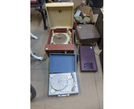 Four record players and a typewriter