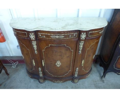 A reproduction French Louis XV style walnut effect marble topped commode
