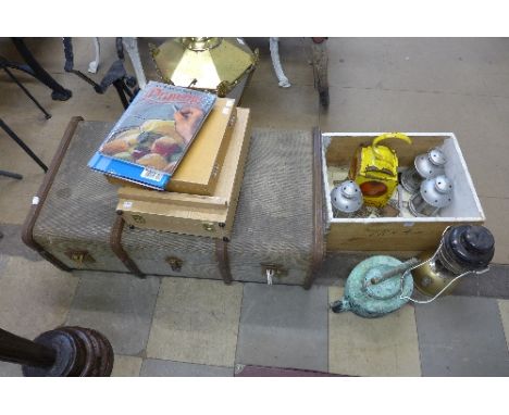 A box of assorted lights, a copper kettle, a 19th Century mahogany Vienna clock, two paint boxes and a banded travel trunk