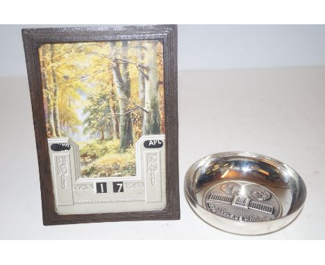 Vintage calendar together with a french plated dish