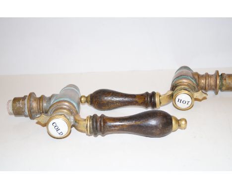 Pair of Victorian brass and enamel hot and cold water taps