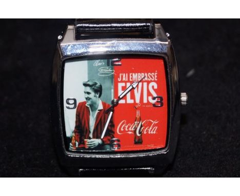 Elvis / Coca Cola quartz wristwatch. Inscribed on the back "Jack Daniels Tennessee whisky" With leather strap