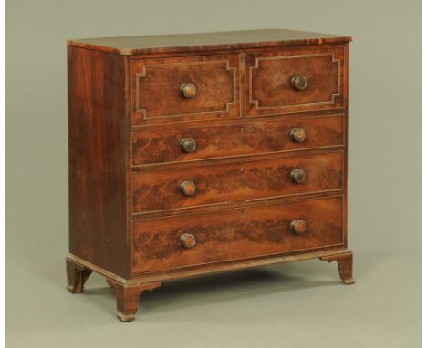 A Regency mahogany secretaire chest of drawers, with moulded edge above a fitted secretaire drawer with three further graduat