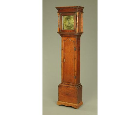 An 18th century oak longcase clock with thirty hour movement and single pointer, the case with moulded cornice above a glazed