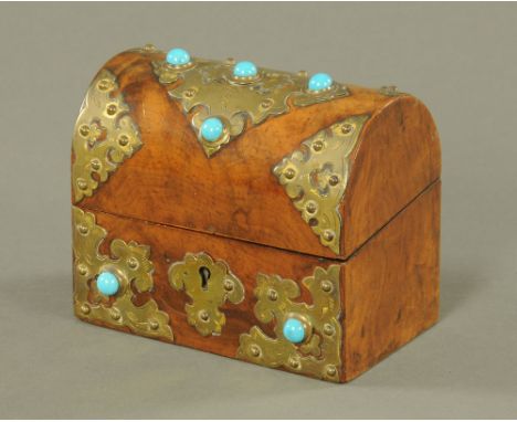 A Victorian walnut and gilt metal mounted, cabochon and turquoise inset, domed top two division inkwell holder.  13 cm high, 