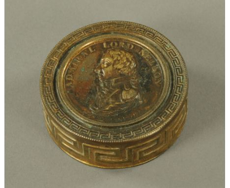 An early 19th century Admiral Lord Nelson commemorative snuff box.  Diameter 7.5 cm.